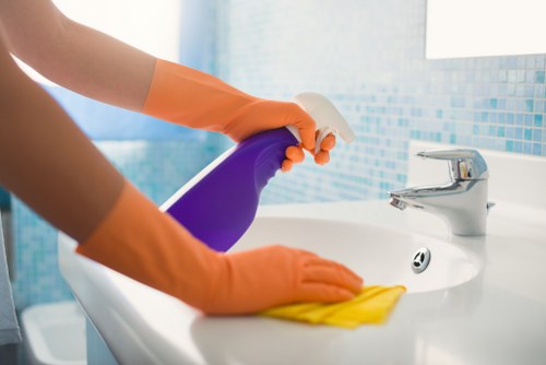 Professional cleaning of an office workspace and shared surfaces